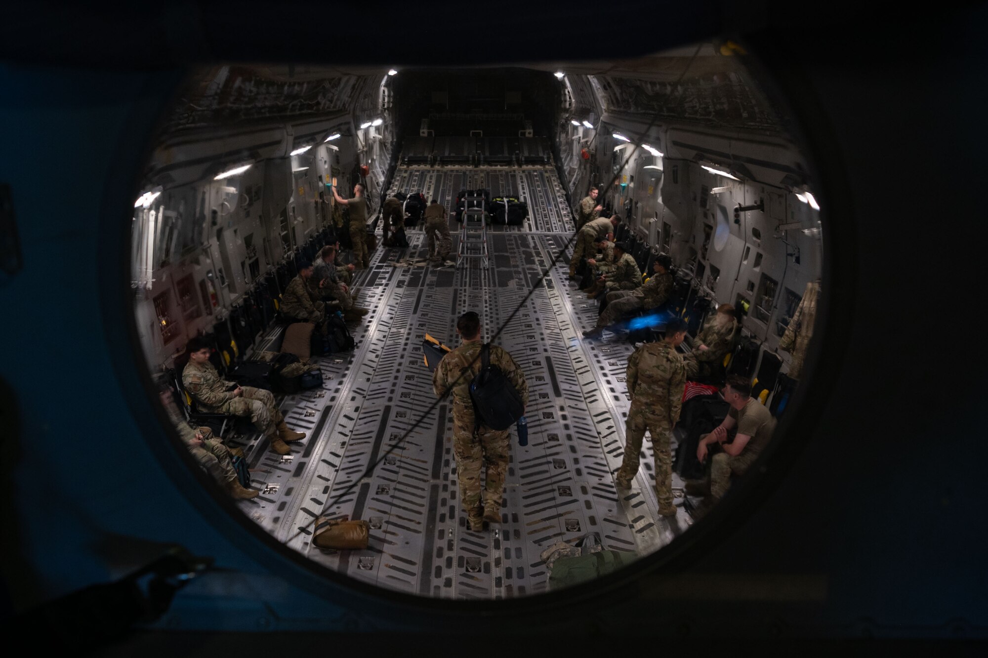 U.S. Air Force Airmen assigned to the 305th Air Mobility Squadron prepare to depart in a C-17 Globemaster III at Joint Base McGuire-Dix-Lakehurst, N.J., June 4, 2024. The crew participated in exercise Valiant Shield, which allows for the integration of all service branches in the Indo-Pacific Command Joint Forces area of responsibility to conduct precise, lethal and multi-domain capabilities with our allies. (U.S. Air Force photo by Staff Sgt. Monica Roybal)