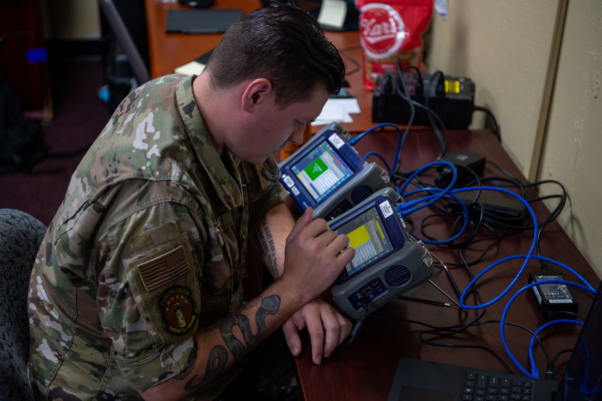 U.S. Air Force Senior Airman Joshua Balmer, 85th Engineering Installation Squadron cyber transport system technician operates a T-BERD 5800 at Andersen Air Force Base, Guam, July 10, 2024.
