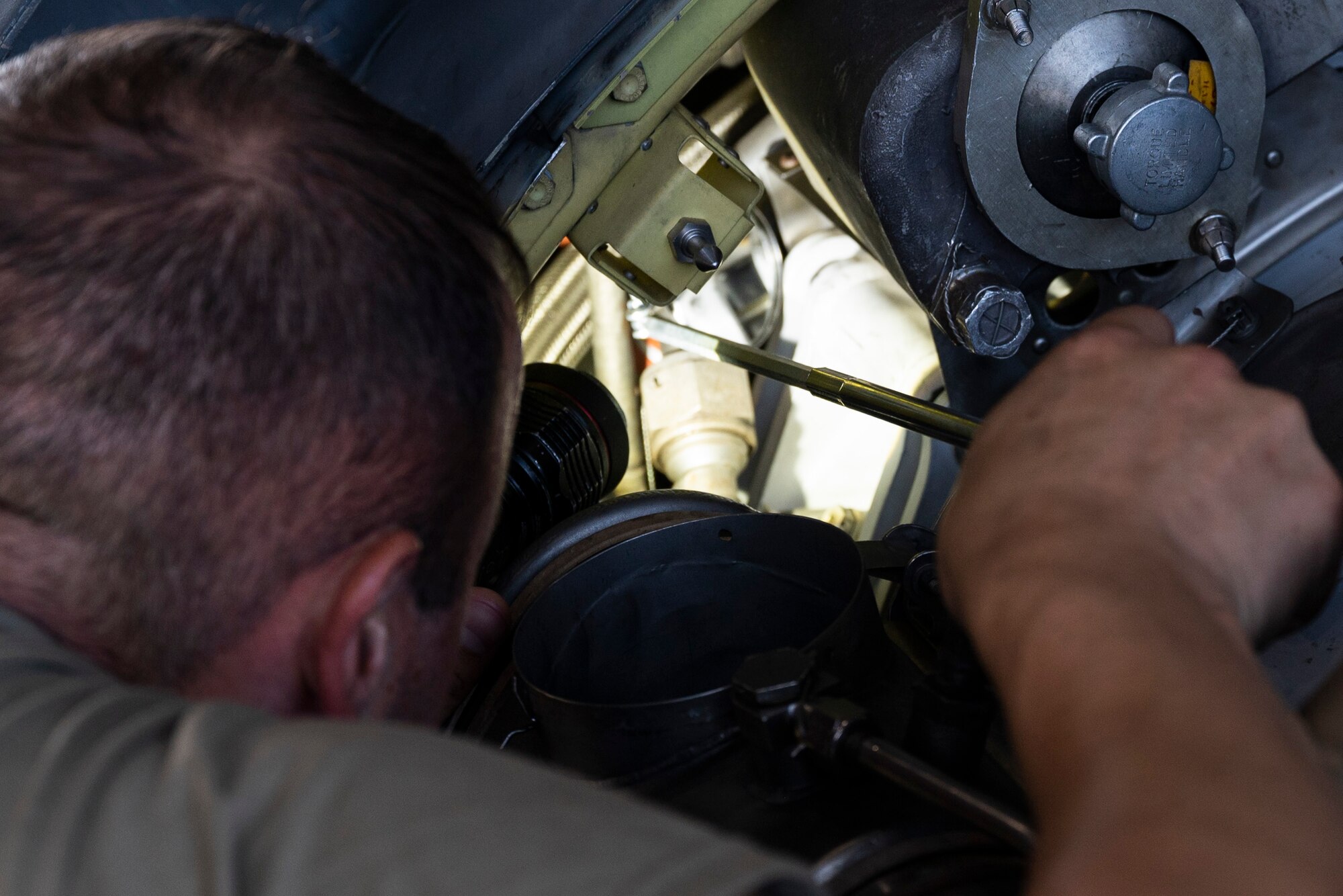 Airman  works on B-52 engine