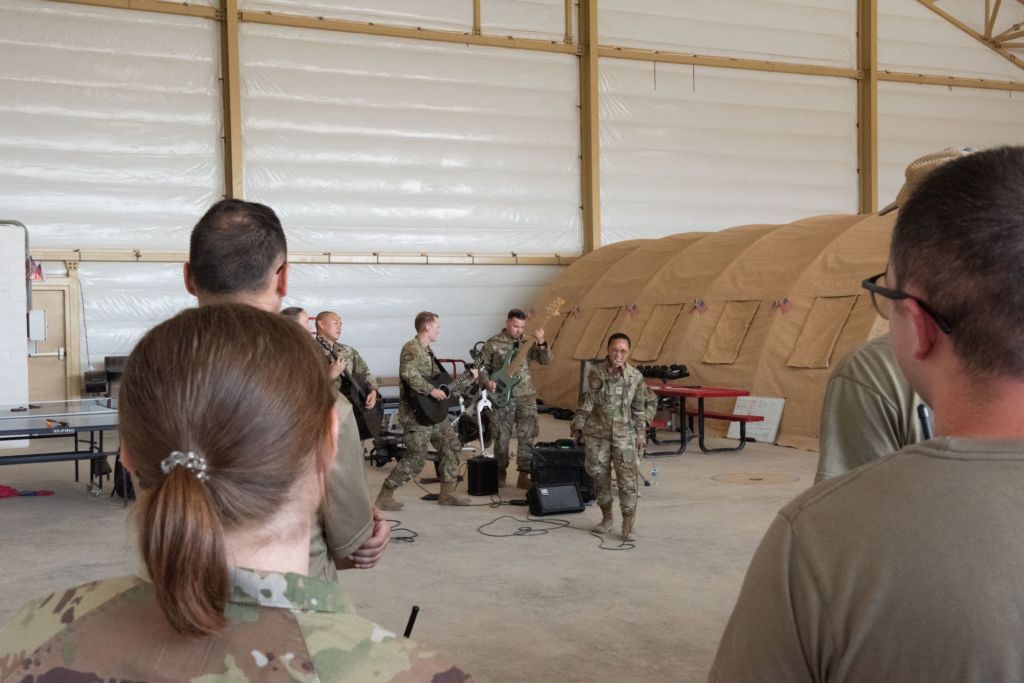 U.S. Air Force Airmen, assigned to the U.S. Air Force’s Central band performs at an undisclosed location in the U.S. Central Command area of responsibility, July 4, 2024.The AFCENT Band is a versatile group of musicians that showcase a wide variety of music ranging from Top 40, pop, rock, R&B, country, and jazz. (U.S. Air Force photo)