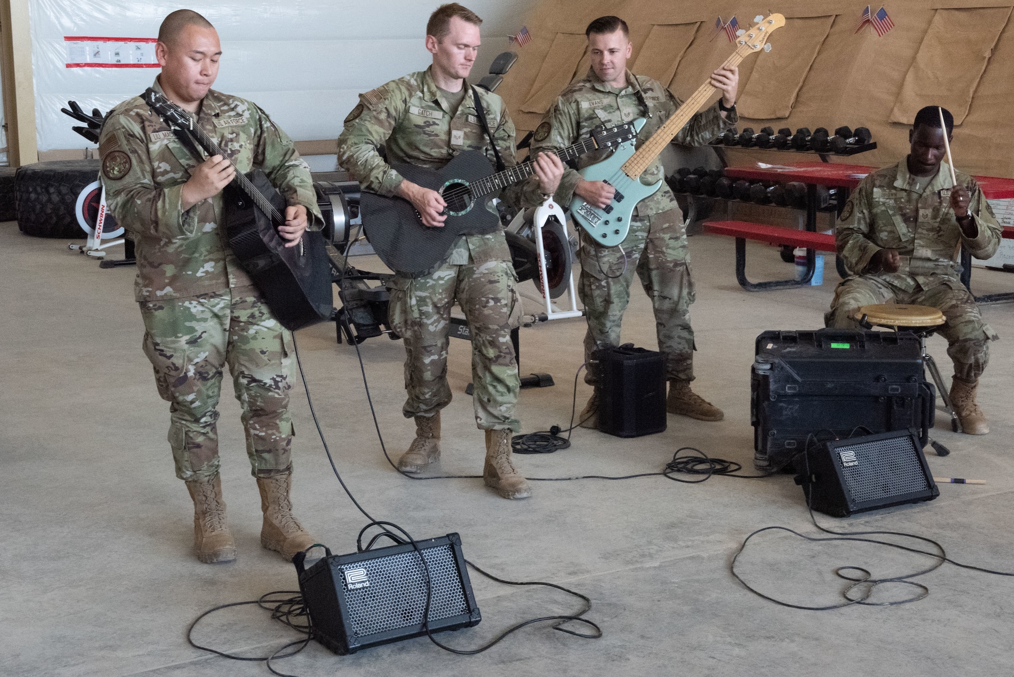 U.S. Air Force Airmen, assigned to the U.S. Air Force’s Central band performs at an undisclosed location in the U.S. Central Command area of responsibility, July 4, 2024. The band is comprised of deployed Airmen from Active Duty and Air National Guard bands. (U.S. Air Force photo)