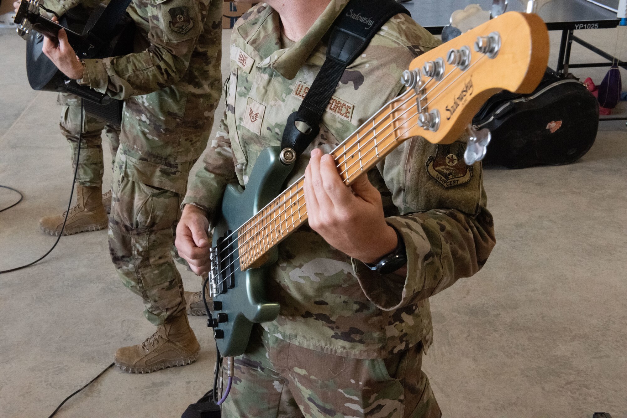 U.S. Air Force Airmen, assigned to the U.S. Air Force’s Central band performs at an undisclosed location in the U.S. Central Command area of responsibility, July 4, 2024. The AFCENT Band is a versatile group of musicians that showcase a wide variety of music ranging from Top 40, pop, rock, R&B, country, and jazz. (U.S. Air Force photo)