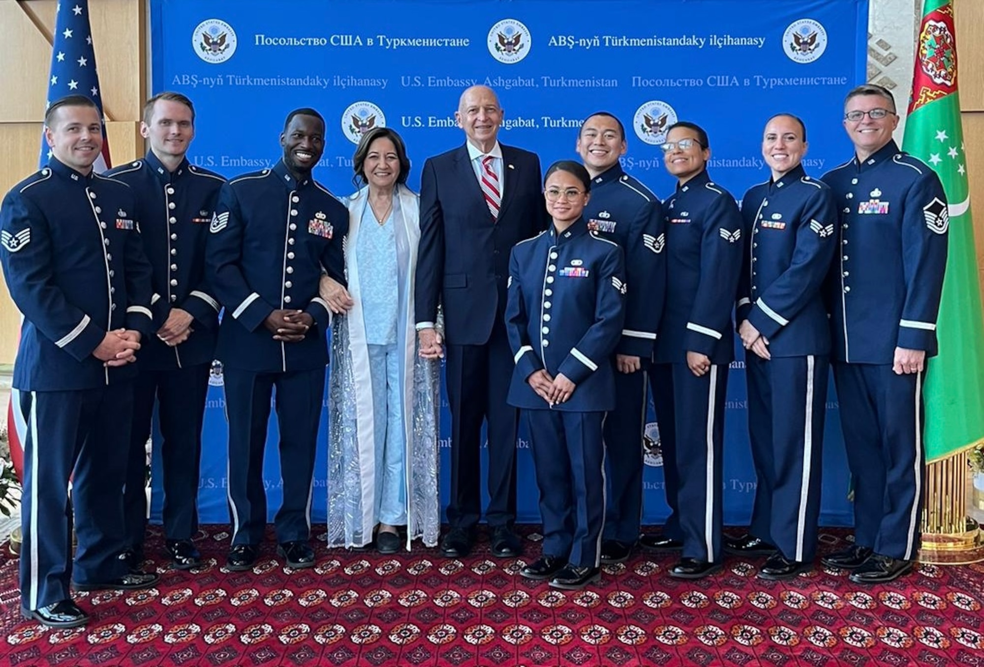 The U.S. Air Forces Central Band poses for a photo with U.S. Ambassador Matthew S. Klimow during a National Day engagement in Turkmenistan, July 3, 2024. The AFCENT Band travels throughout the U.S. Central Command area of responsibility to bolster AFCENT priorities by building international partnerships, strengthening intergovernmental alliances and furthering military diplomacy. (Courtesy photo)
