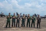 Philippine Air Force pilots welcome U.S. Air Force pilots from the 199th Expeditionary Fighter Squadron following a successful inaugural landing during the Marine Aviation Support Activity 24, at Basa Air Base, Philippines, June 13, 2024. The 199th EFS comprises19th and 199th Fighter Squadrons known as the Hawaiian Raptors based out of Joint Base Pearl Harbor-Hickam, Hawaii.