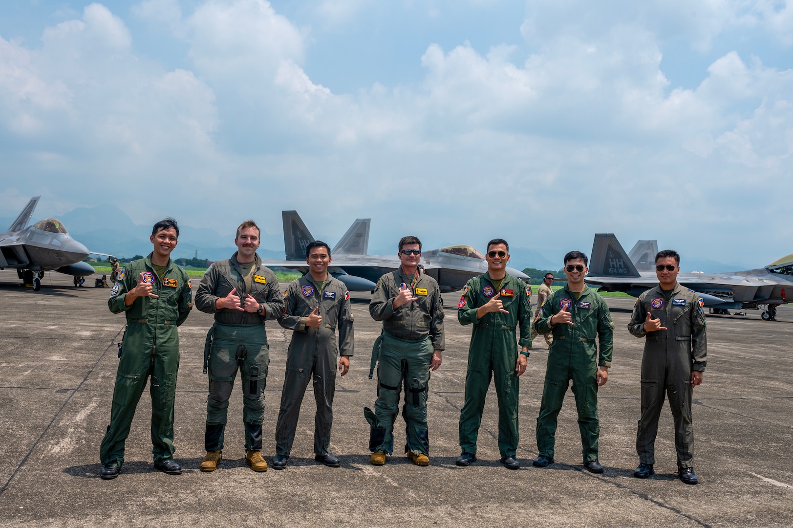 Philippine Air Force pilots welcome U.S. Air Force pilots from the 199th Expeditionary Fighter Squadron following a successful inaugural landing during the Marine Aviation Support Activity 24, at Basa Air Base, Philippines, June 13, 2024. The 199th EFS comprises19th and 199th Fighter Squadrons known as the Hawaiian Raptors based out of Joint Base Pearl Harbor-Hickam, Hawaii.