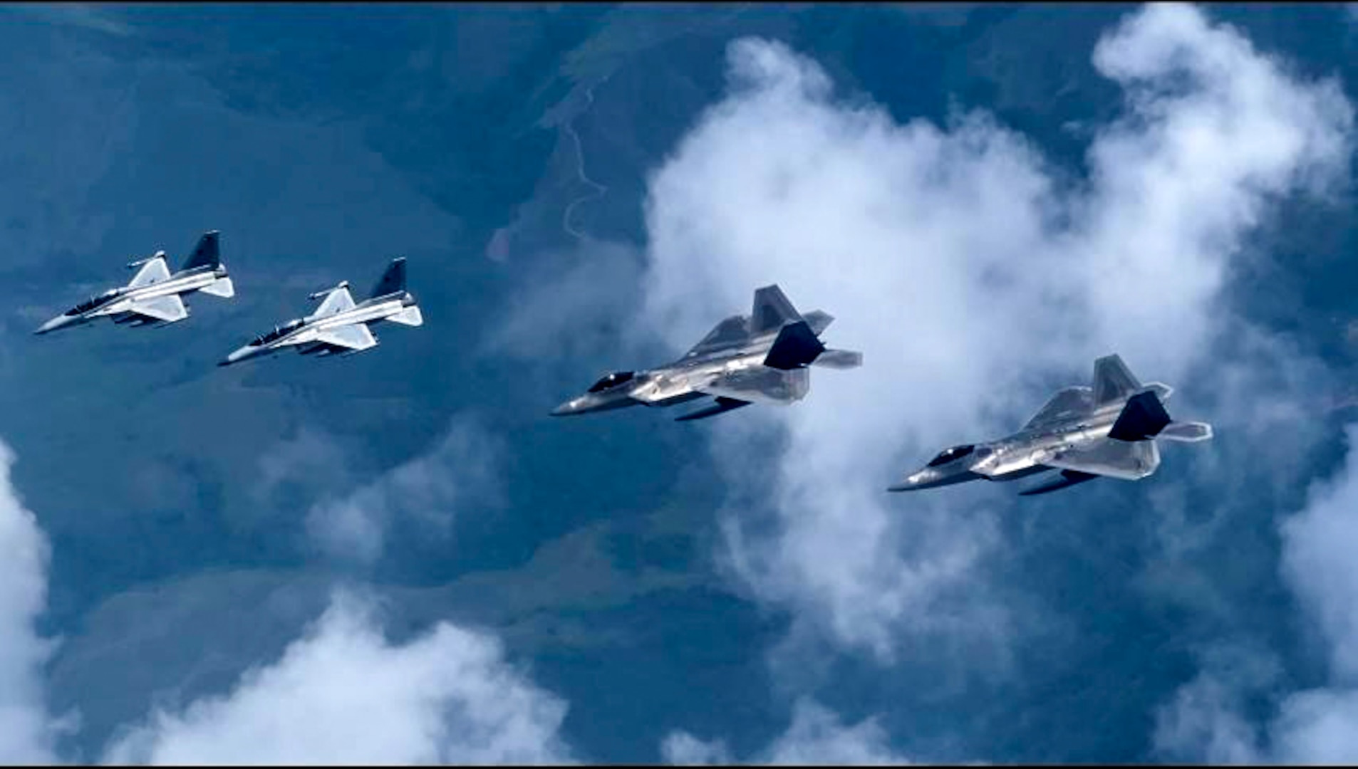 Philippine Air Force FA-50’s fly alongside U.S. Air Force F-22 Raptors form the 199th Expeditionary Fighter Squadron during low-level training at Basa Air Base, Philippines, June 14, 2024. The training showcased the Philippine-U.S. combined capabilities of operating fifth-generation aircraft in the region.