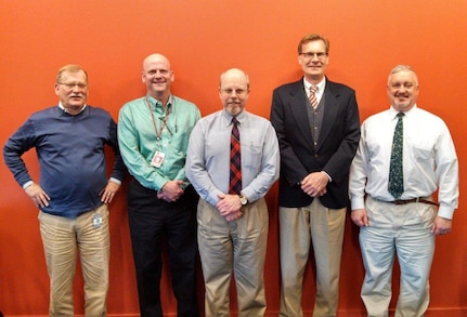 The CG Historian's Office Team in 2014 at USCG HQ; from left to right: Dr. Dave Rosen (PACAREA Historian); Scott Price (Deputy Historian); Dr. Robert M. Browning, Jr. (Chief Historian); Dr. William Thiesen (LANTAREA Historian); & Chris Havern (Assistant Historian).