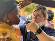 U.S. Air Force Tech. Sgt. Taylor Johnson, Optometry Specialist, 158th Fighter Wing, Vermont Air National Guard, conducts eye exams at the Tambcounda regional medical center in Tambacounda, Senegal.