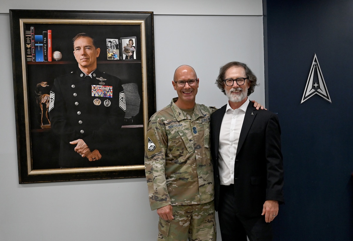 Chief Master Sgt. of the Space Force John Bentivegna and Roger A. Towberman, the first CMSSF, pose for a photo following a portrait unveiling ceremony at the Pentagon, Arlington, Va., July 9, 2024. During his more than three years as CMSSF, Towberman was instrumental in developing the service’s core values, overseeing the stand up of three new service components, and updating the service’s approach to talent management, among many other accomplishments. (U.S. Air Force photo by Chad Trujillo)
