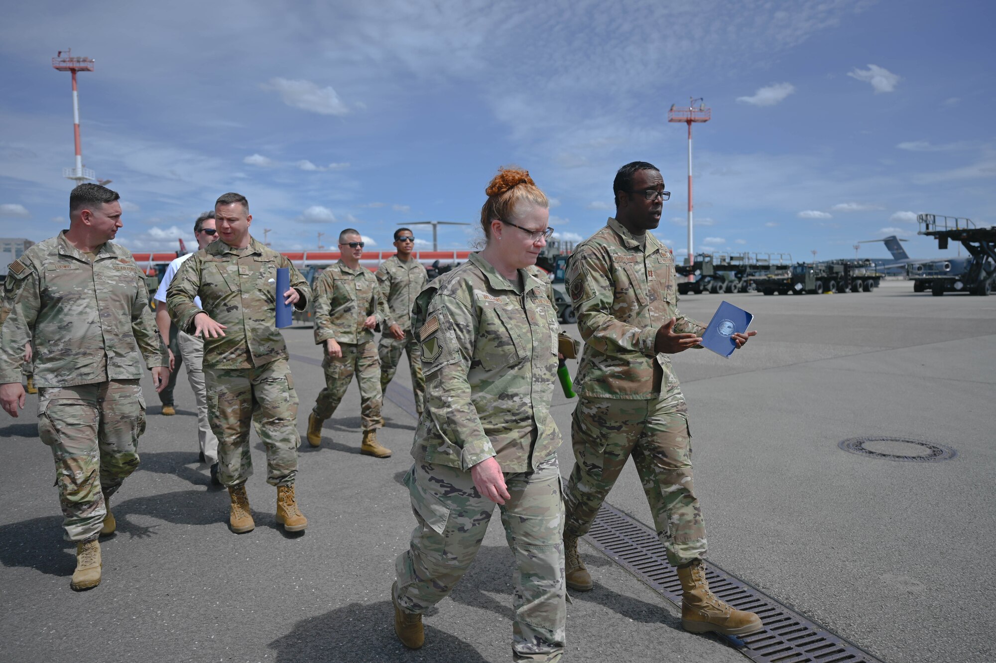 U.S. Air Force General Williams walks with 86th Logistics Readiness Group members