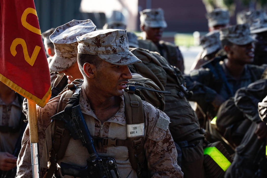 U.S. Marine Corps Pvt. Ali Abbas, a Marine with Echo Company, 2nd Recruit Training Battalion, completes the transformation from civilian to Marine on Marine Corps Recruit Depot Parris Island, S.C., July 12, 2024. To complete recruit training Abbas had to complete numerous events such as physical fitness tests, rifle qualification, obstacle courses, CBRN and rappel training, all culminating with the Crucible. (U.S. Marine Corps photo by Lance Cpl. William Horsley)