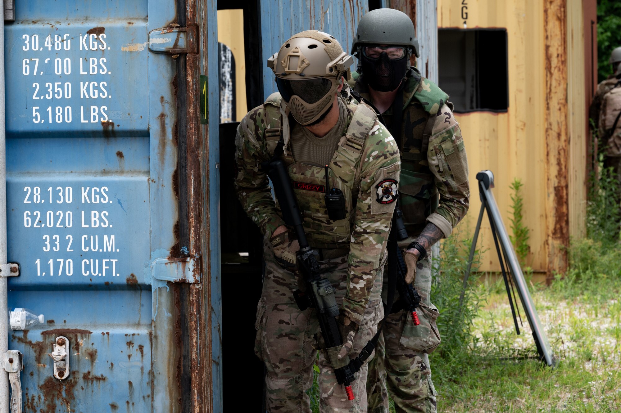 U.S. Air Force Staff Sgt. Chris Denney, Tactics and Leadership Nexus cadre, and an Airman prepare to engage a target during a training exercise at the TALN training site at Dover Air Force Base, Delaware, July 11, 2024. The new airsoft rifles used during the exercises improved the deployment training experience, simulating a more realistic approach to carrying and firing weapons while also being a safer and easier option over an M4 rifle using simunition non-lethal training rounds. (U.S. Air Force photo by Airman Liberty Matthews)