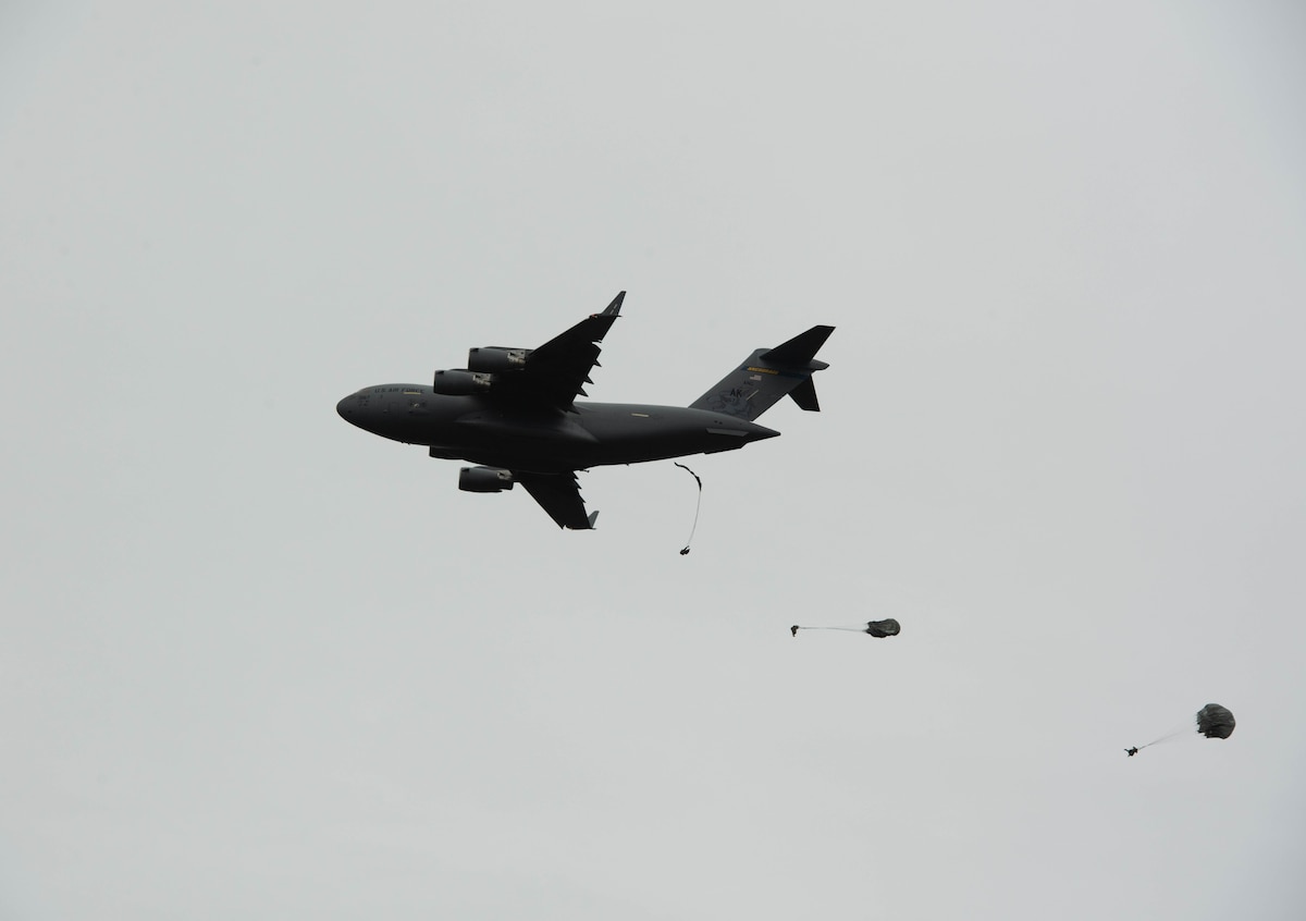 Pararescuemen, paratroopers, tactical air controllers conduct joint airborne operations