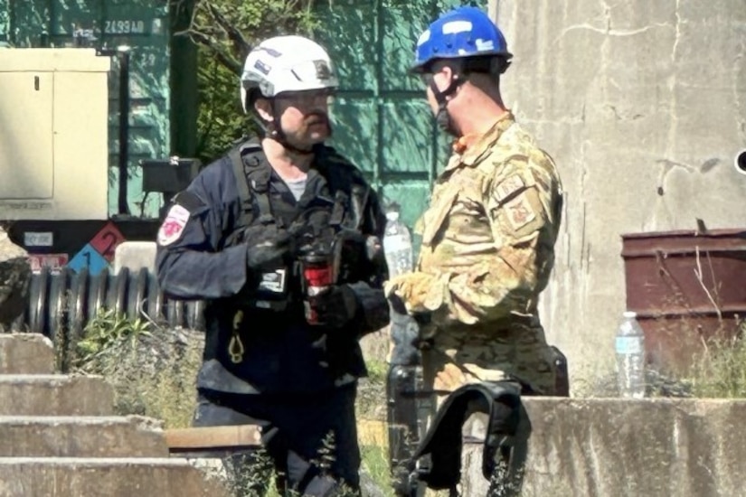 Pennsylvania Air National Guardsman Staff Sgt. Robert Gregor receives instruction from Pennsylvania Strike Team 1 member Mike Petrone at the stitch cut station at the Allegheny County Fire Academy, May 8, 2024. The partnership between the 171st and PA ST1 allows for shared resources and expertise, and provides a comprehensive training environment that benefits participants and the communities they serve. (courtesy photo)