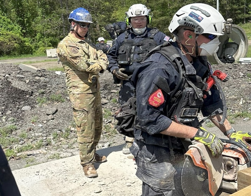 Pennsylvania Air National Guardsman Staff Sgt. Gregor with the 171st Air Refueling Wing Fire and Emergency Services Flight receives instruction from a member of Pennsylvania Strike Team 1, at the Allegheny County Fire Academy, May 8, 2024. The partnership between the 171st and PA ST1 allows for shared resources and expertise, and provides a comprehensive training environment that benefits participants and the communities they serve. (courtesy photo)