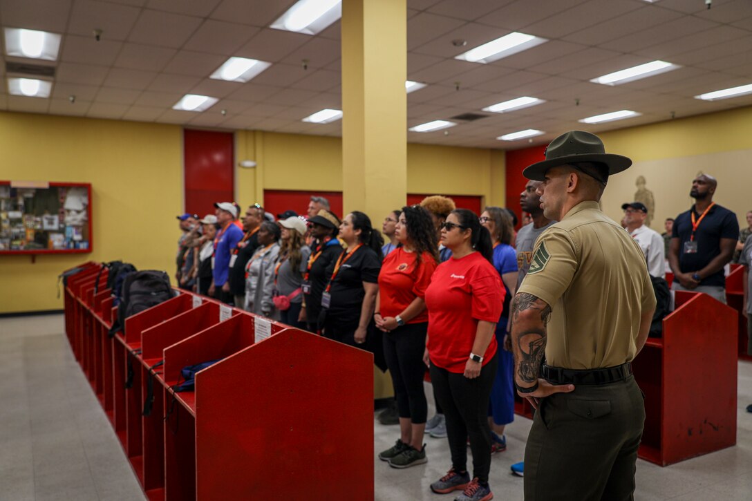 Educators and influencers participating in Marine Corps Recruit Depot San Diego's Educators Workshop receive an introductory brief on June 24, 2024. Educators and influencers with Recruiting Station Albuquerque visited MCRD San Diego to observe recruit training and gain a better understanding about the transformation from recruit to United Stated Marine. They also received classes and briefs on the benefits that are provided to service members serving in the U.S. Armed Forces. (U.S. Marine photo by Sgt. Mark A. Morales)