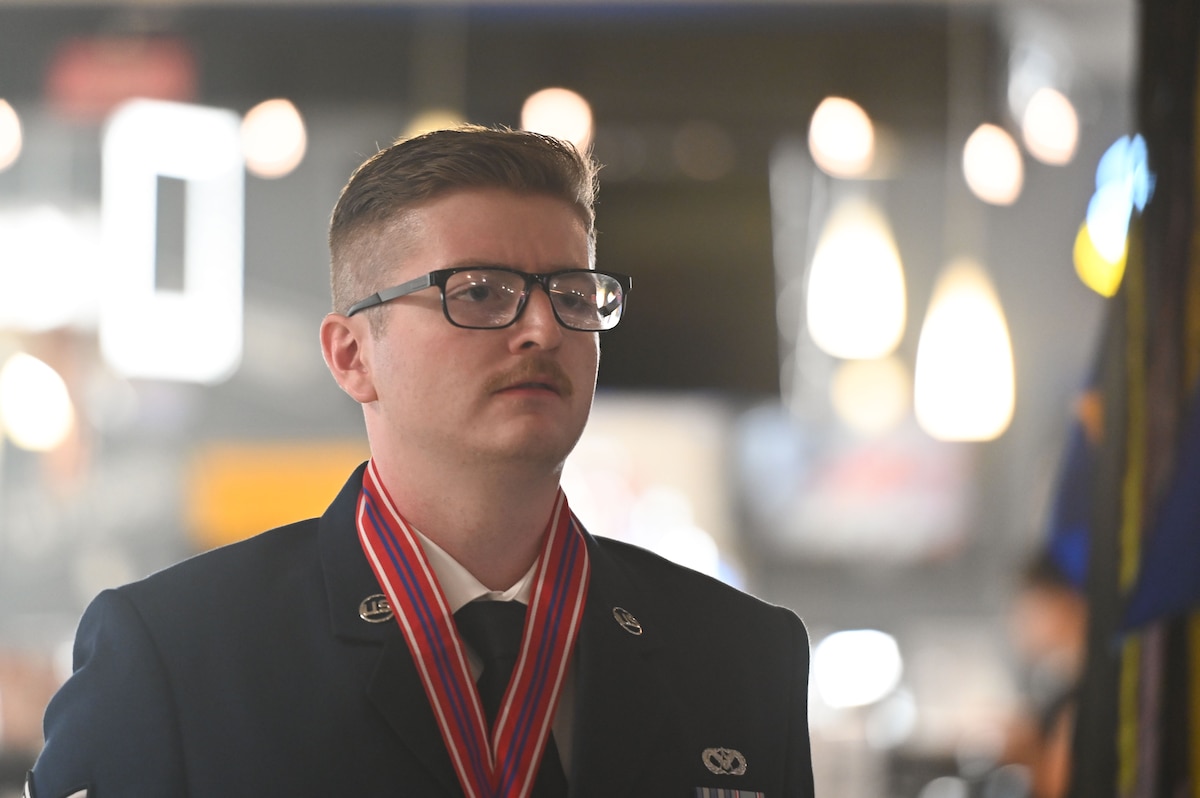 U.S. Air Force Senior Airman Chase McAvaney, 17th Civil Engineer Squadron, recites the Airman’s Creed at the Airman Leadership School class 24-E graduation at the Powell Event Center, Goodfellow Air Force Base, Texas, July 11, 2024. ALS is a five-week course designed to prepare senior airmen to assume supervisory duties through instruction covering leadership, followership, written and oral communication skills, and the profession of arms. (U.S. Air Force photo by Airman 1st Class Brian Lummus)