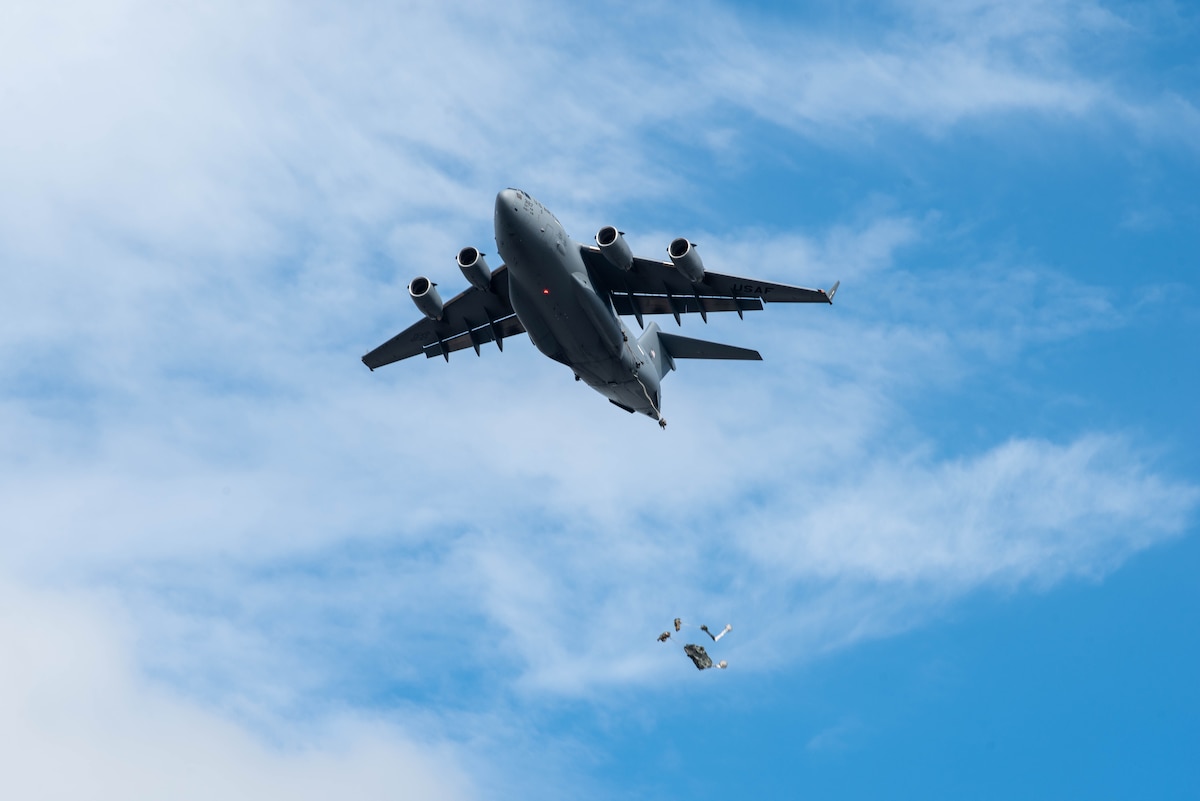 A U.S. Air Force C-17 Globemaster III drops U.S. Army Soldiers from the 11th Airborne Division.