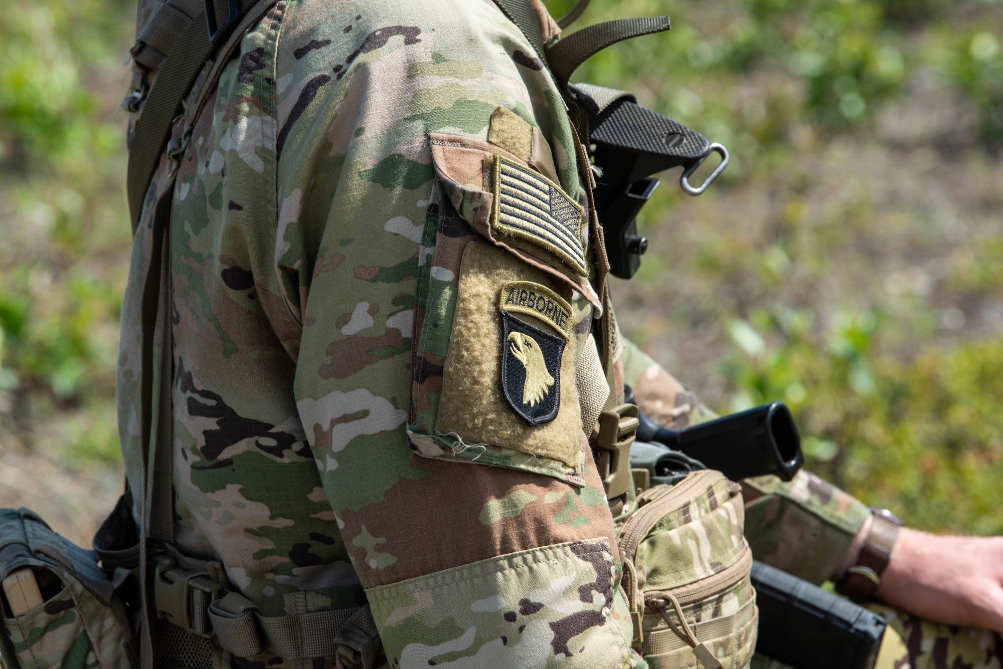 A U.S. Army Soldier from the 11th Airborne Division sits by his company at Fort Greely, Alaska.
