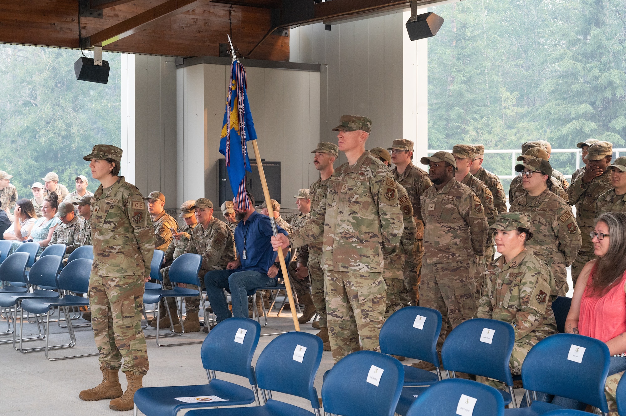 Airmen assigned to the 354th Civil Engineering Squadron stand in formation during a Change of Command ceremony.