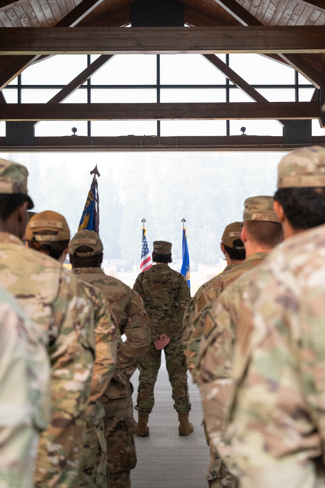 Airmen assigned to the 354th Civil Engineering Squadron stand in formation during a Change of Command ceremony.