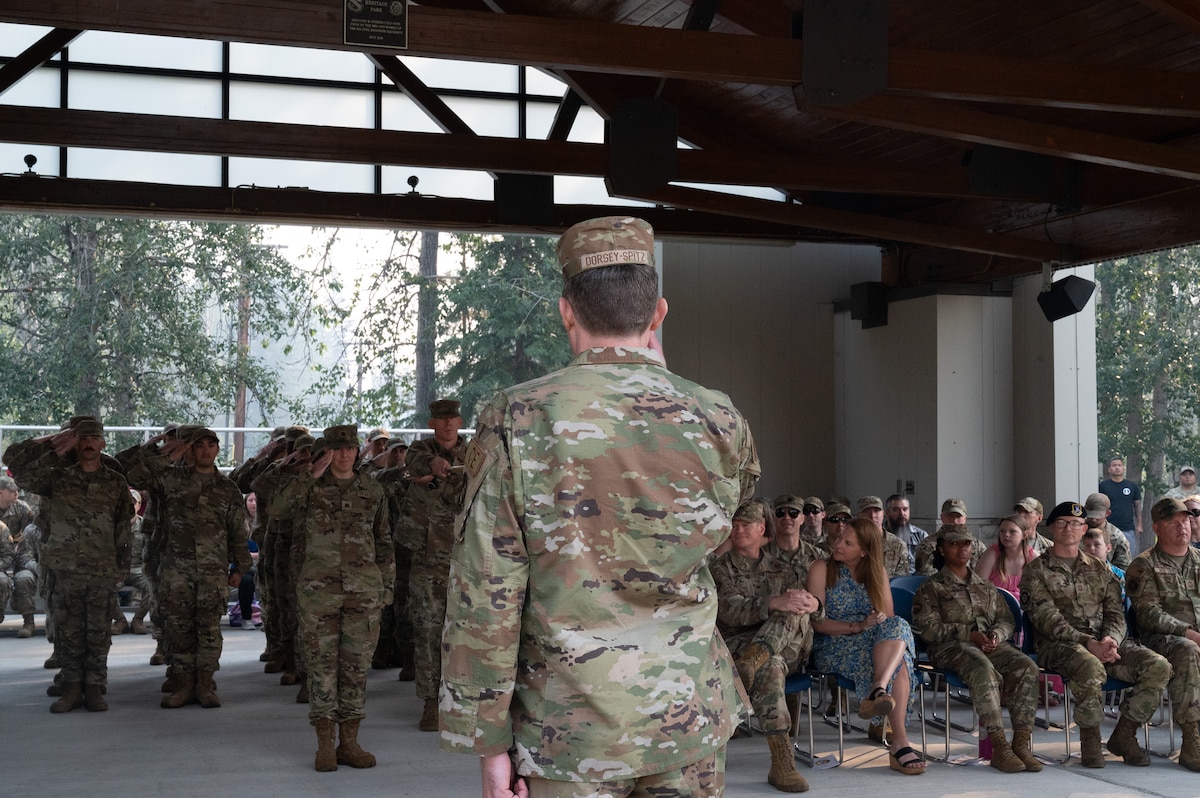 A new squadron commander renders an initial salute during a change of command ceremony.