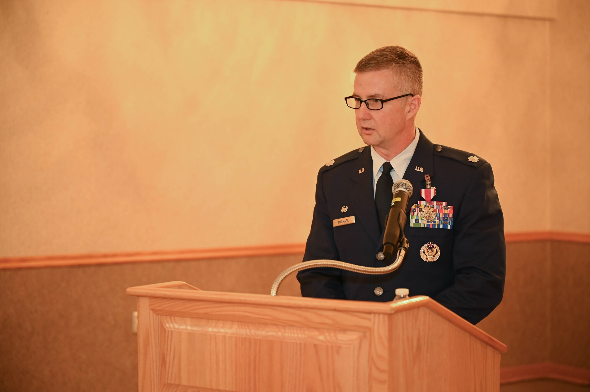 U.S. Air Force Lt. Col. Donald Michael speaks at a ceremony.