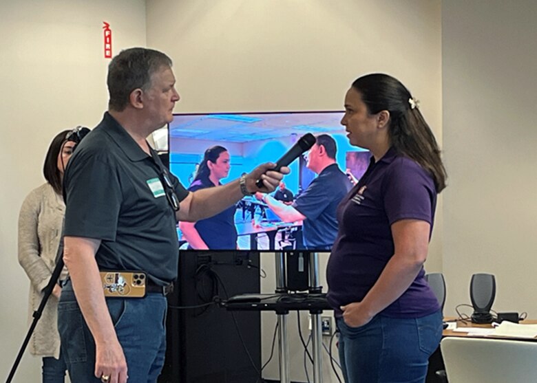Dr. Joseph V. Trahan, President and Chief Executive Officer of Trahan & Associates, conducts a mock interview with Elisa Bilbao, a Civil Engineer, with the U.S. Army Corps of Engineers Task Force Virgin Islands/ Puerto Rico during a Strategic Communications and Media skills training evolution.  The three-day training session is part of a year-long class with the Jacksonville District Leadership Development Program.   (USACE photo by Peggy Bebb)
