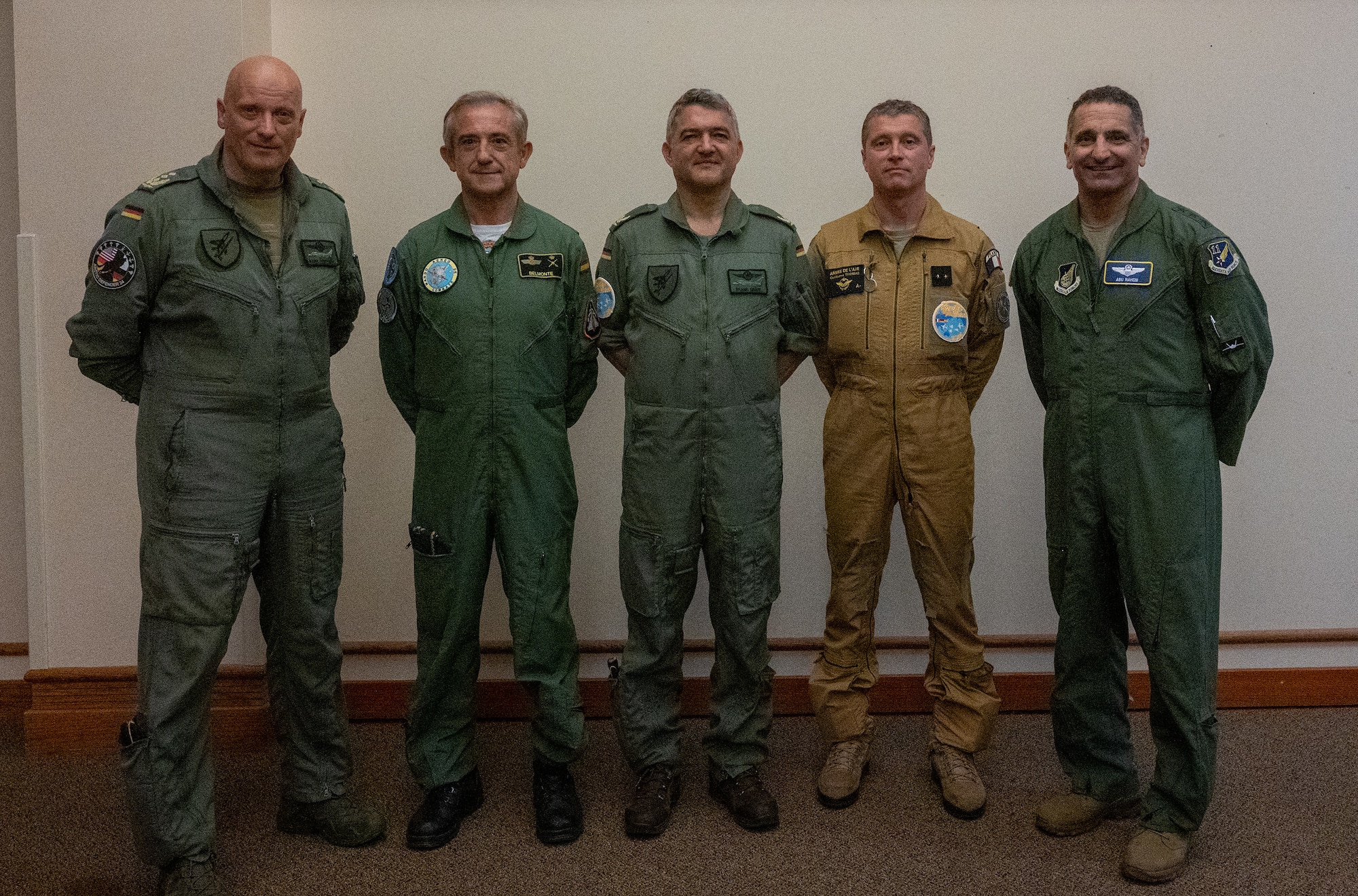 Generals from Germany, Canada, Spain, France and the United States Air Force stand together to pose for a group photo.