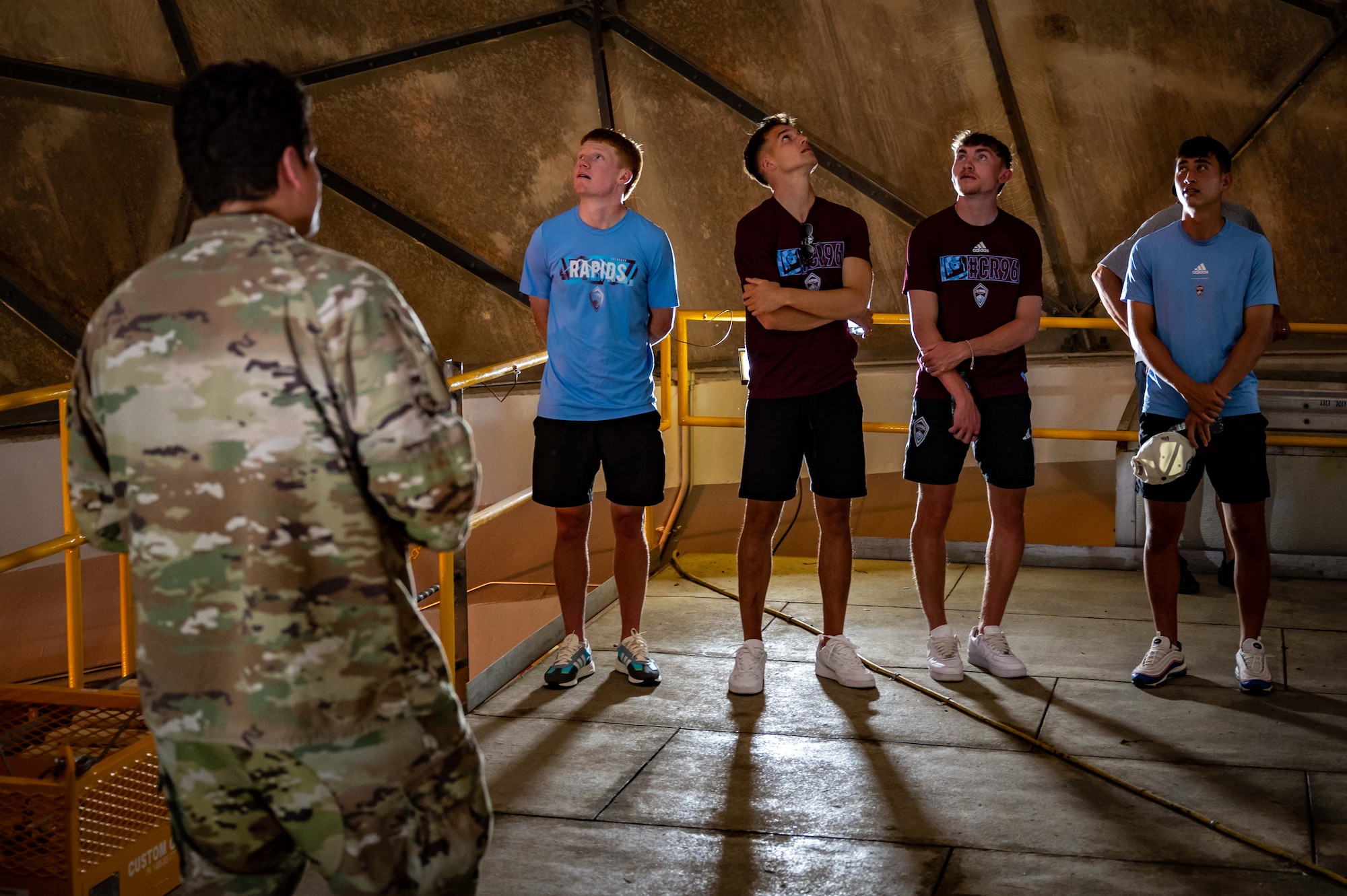 Man talking to soccer players
