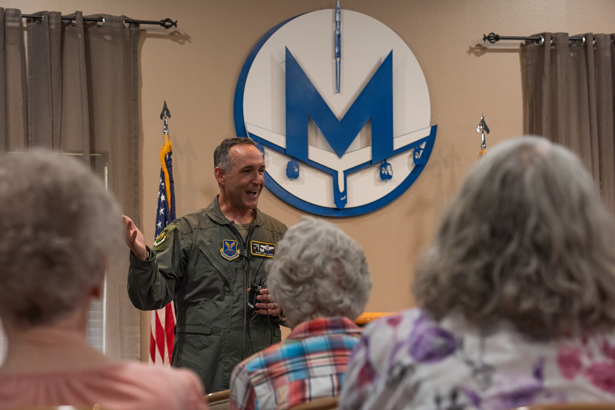 U.S. Air Force Col. Jesse Lamarand, 5th Bomb Wing commander, speaks to military retirees during Retiree Appreciation Day at Minot Air Force Base, North Dakota, July 12, 2024. Lamarand participated in a Q&A event with the military retirees. (U.S. Air Force photo by Senior Airman Kyle Wilson)