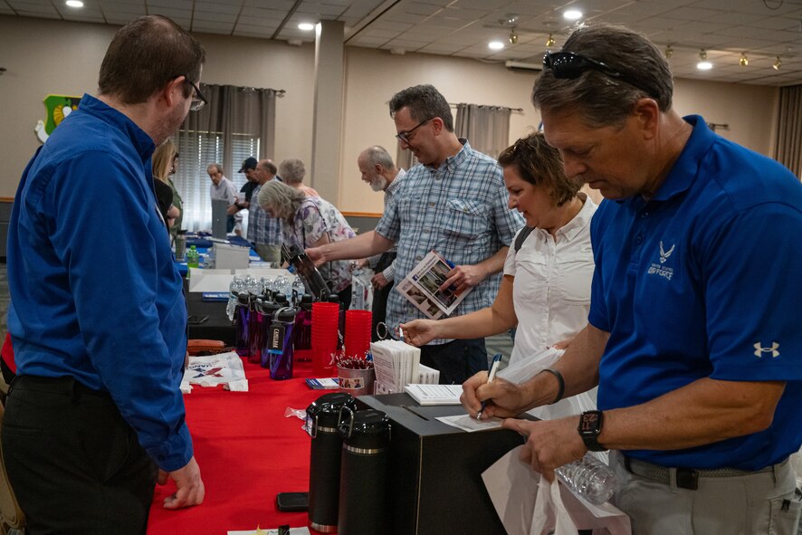 Military retirees engage with supporting agencies during Retiree Appreciation Day at Minot Air Force Base, North Dakota, July 12, 2024. A number of agencies attended Retiree Appreciation Day to provide support to military retirees. (U.S. Air Force photo by Senior Airman Kyle Wilson)