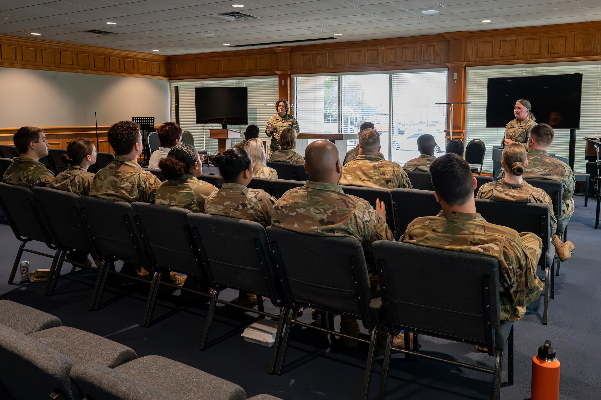 airmen sit for a briefing