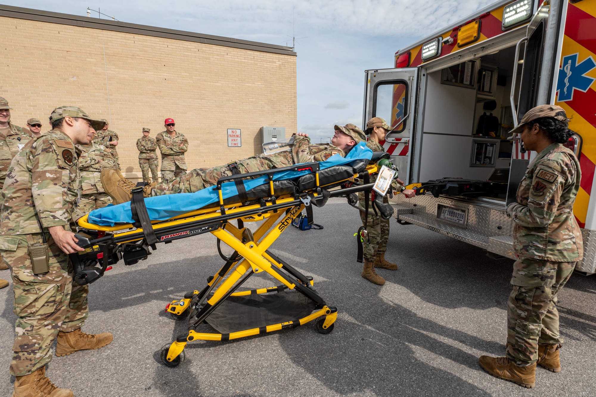 Airmen simulate loading patient
