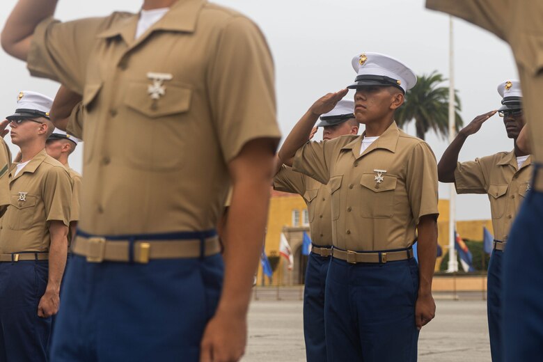 U.S. Marine Corps Pvt. Carlos Paz-Sosa, a Marine with India Company, 3rd Recruit Training Battalion, Recruit Training Regiment, renders a proper salute during a graduation ceremony at Marine Corps Recruit Depot San Diego, California, July 12, 2024. Paz-Sosa was highlighted due to his impressive transformation, losing more than100 lbs. in order to become a Marine. (U.S. Marine Corps photo by Cpl. Elliott A. Flood-Johnson)