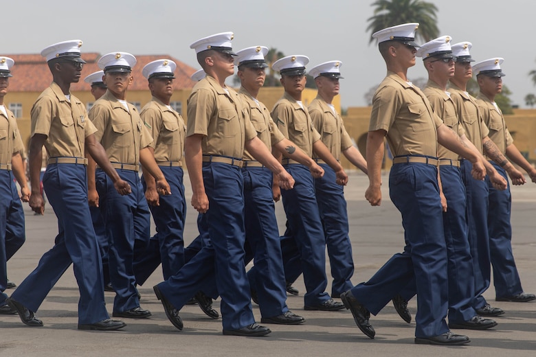 U.S. Marine Corps Pvt. Carlos Paz-Sosa, a Marine with India Company, 3rd Recruit Training Battalion, Recruit Training Regiment, conducts a pass and review during his graduation ceremony at Marine Corps Recruit Depot San Diego, California, July 12, 2024. Paz-Sosa was highlighted due to his impressive transformation, losing more than 100 lbs. in order to become a Marine. (U.S. Marine Corps photo by Cpl. Elliott A. Flood-Johnson)