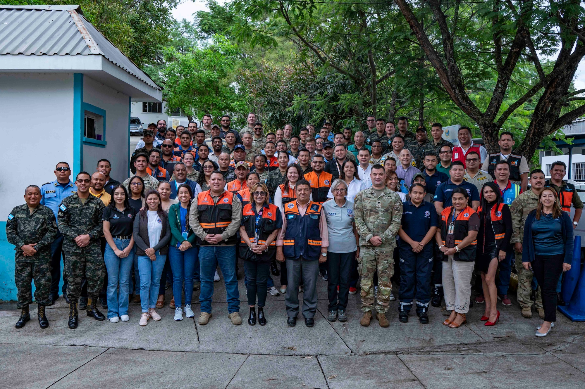 A photo of a large group of people posing for a photo.