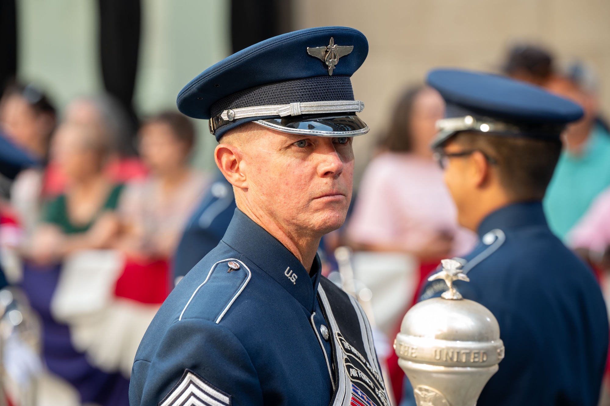 military drum major stands with military band