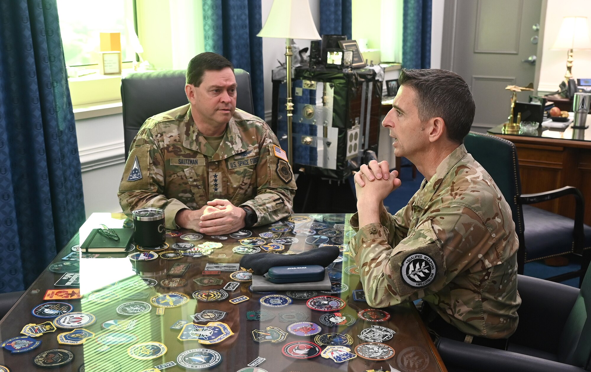 Chief of Space Operations Gen. Chance Saltzman hosts an office call to officially welcome U.K. Air Vice Marshal Paul Godfrey to the Space Force staff in the Pentagon, Arlington, Va., June 18, 2024. Godfrey is the former commander of U.K. Space Command and the first foreign officer to join the U.S. Space Force command staff. (U.S. Air Force photo by Andy Morataya)