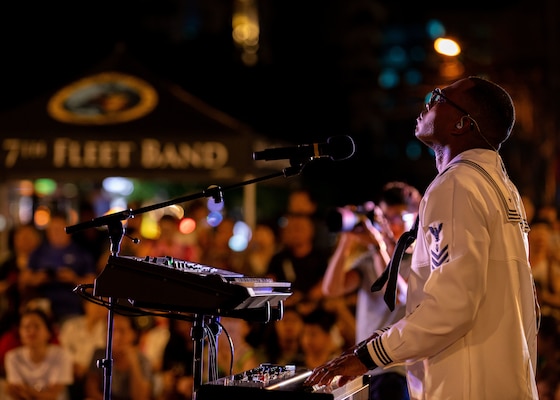 240708-N-PH222-1003 NHA TRANG, Vietnam (July 8, 2024) - Musician 1st Class Bryan Mathis, from Valdosta, Georgia, assigned to U.S. 7th Fleet Bands’ “Orient Express,” embarked aboard U.S. 7th Fleet flagship USS Blue Ridge (LCC 19), performs in front of a live audience during a port visit in Cam Rang International Port, Vietnam, July 8. U.S. 7th Fleet is the Navy’s largest forward-deployed numbered fleet, and routinely interacts and operates with allies and partners in preserving a free and open Indo-Pacific region. (U.S. Navy Photo by Mass Communication Specialist 1st Class Ryan M. Breeden)