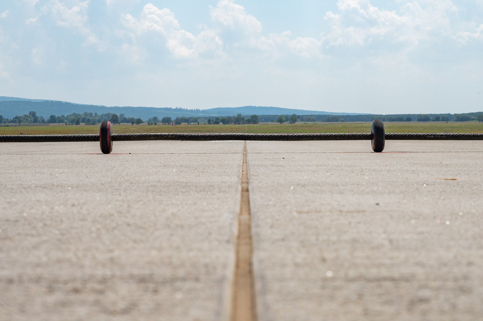 A cable stretches across the runway