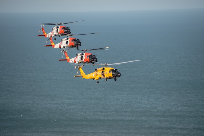 Coast Guard MH-60 Jayhawk helicopters fly flight formations at the Wright Brothers National Memorial, Wednesday, March 10, 2016.