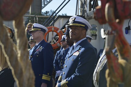 Capt. Will Watson, Coast Guard Sector New Orleans commander (right), stands aboard the U.S. Coast Guard Cutter Barbara Mabrity Feb. 28, 2022. Watson participated in the transport of King Zulu and members of the Zulu Social Aid and Pleasure club to Woldenberg Park in New Orleans