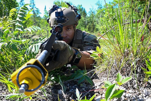 Master Sgt. Darius Collier, 433rd Contingency Response Flight senior leader, trained on advanced field training scenarios that implemented blank ammunitions, smoke grenade procedures, casualty evacuation, beach assaults, and opposing force tactics at the Contingency Location Operations Rehearsal (CLOR 24) in Alpena, Michigan June 27, 2024.