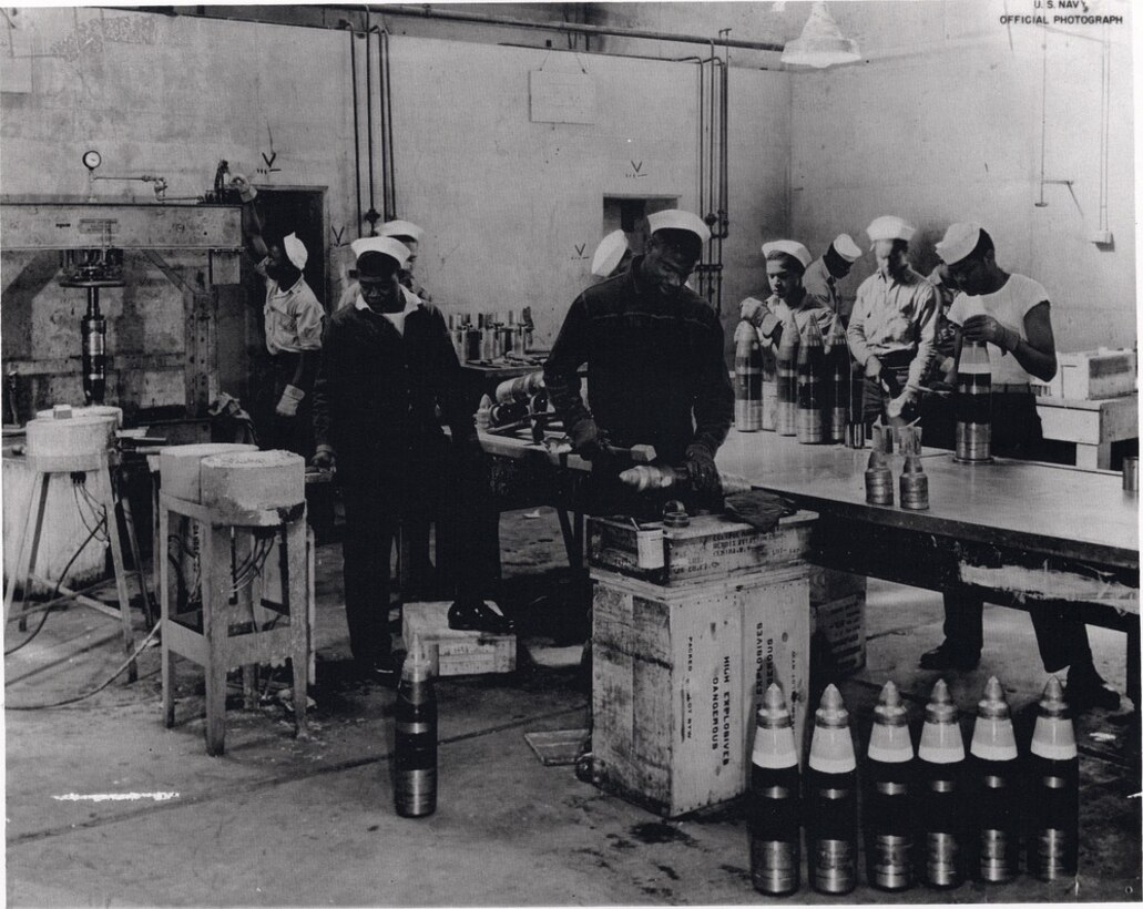 Black stevedores working in a munitions store room at Port Chicago. Image courtesy National Park Service.