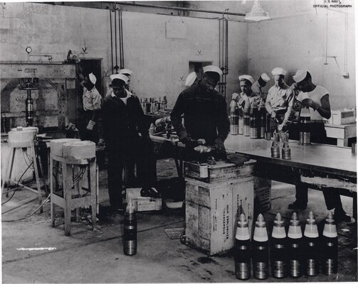 Black stevedores working in a munitions store room at Port Chicago. Image courtesy National Park Service.