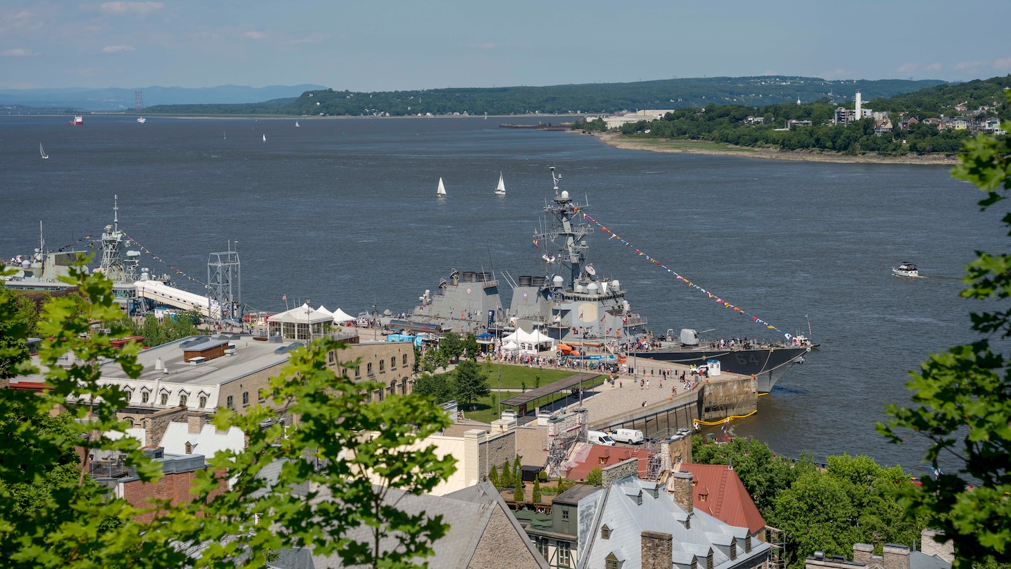 The Arleigh Burke-class guided-missile destroyer USS Carney (DDG 64)  sits pierside in Quebec City, Quebec, July 5, for Rendez-Vous naval de Quebec (RVNQ) 2024.