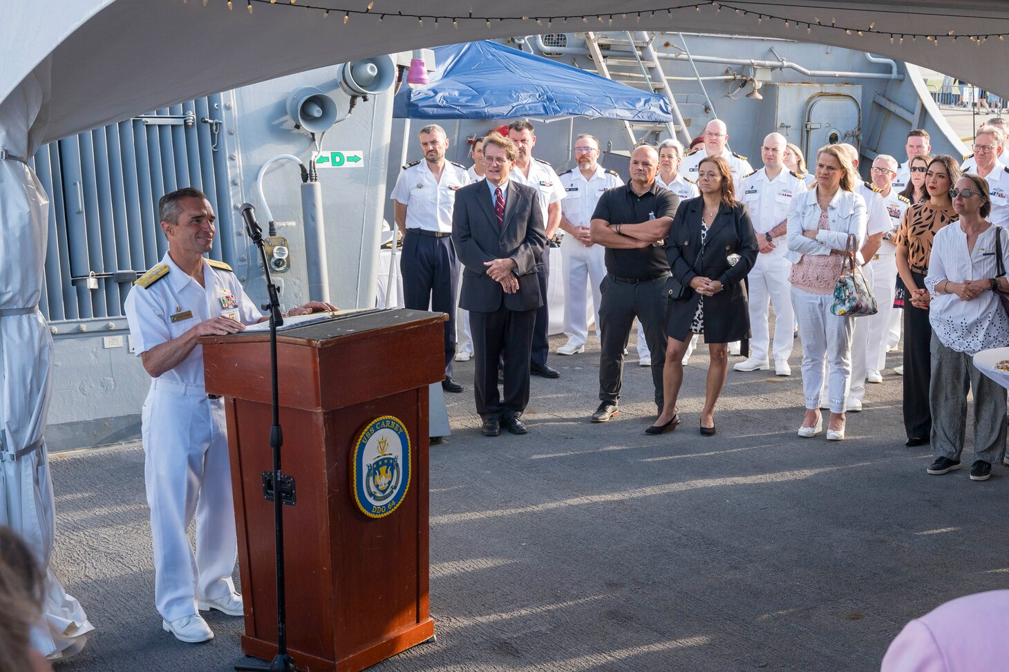 Vice Adm. Doug Perry, commander, U.S. 2nd Fleet, addresses guests at a reception held aboard the Arleigh Burke-class guided-missile destroyer USS Carney (DDG 64) in Quebec City, Quebec, July 6, for Rendez-Vous naval de Quebec (RVNQ) 2024.