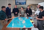 Students and faculty practice complex war scenarios as part of U.S. Naval War College War Gaming Department