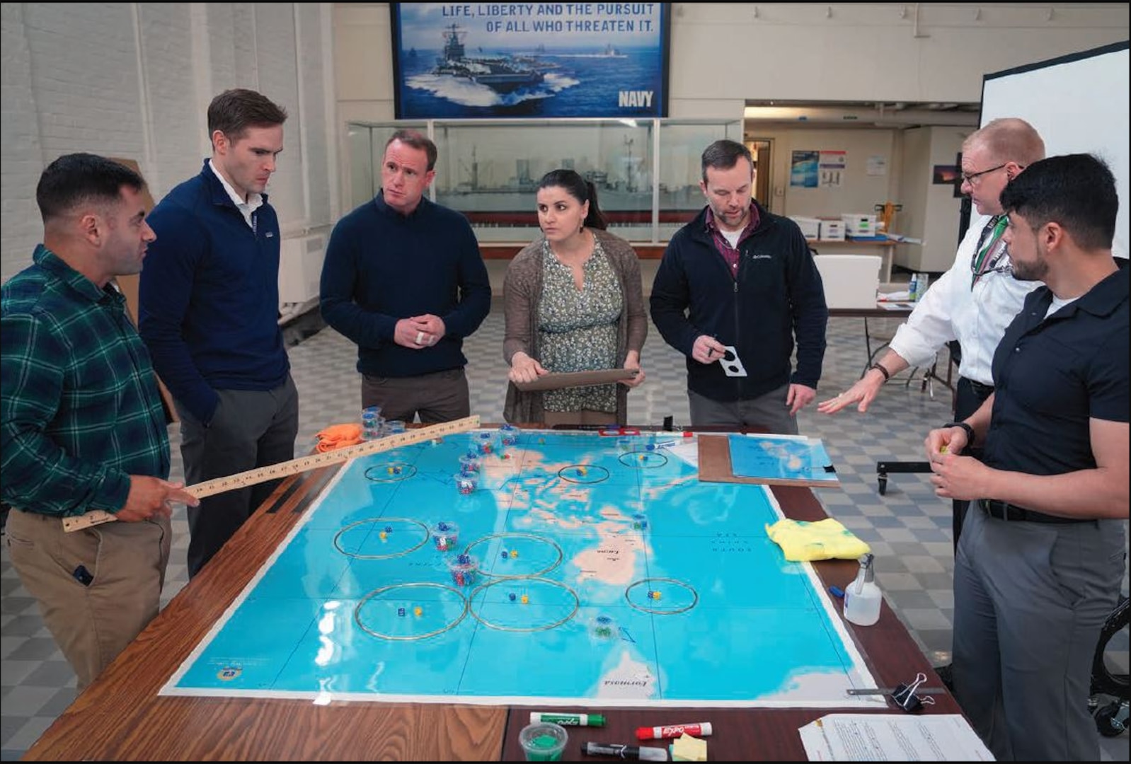 Students and faculty practice complex war scenarios as part of U.S. Naval War College War Gaming Department